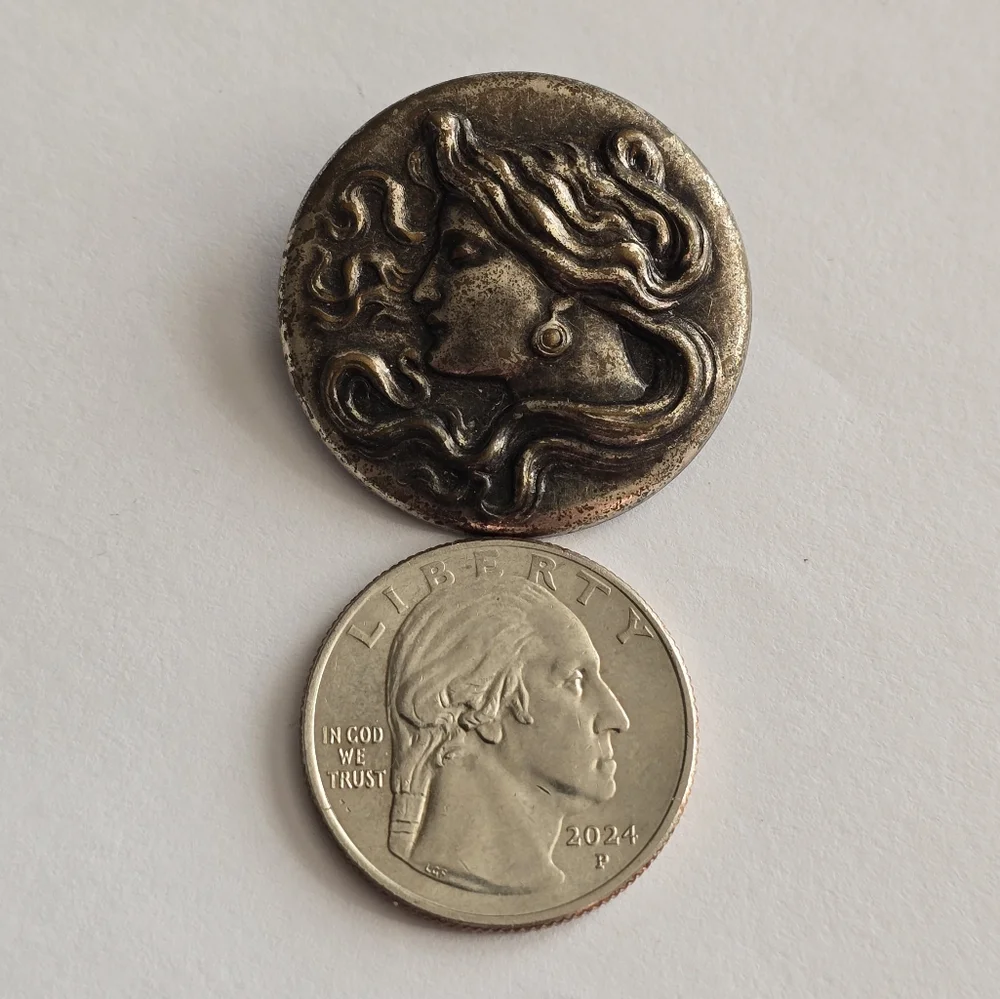 Art Nouveau style brooch woman with flowing hair dark silver tone pin